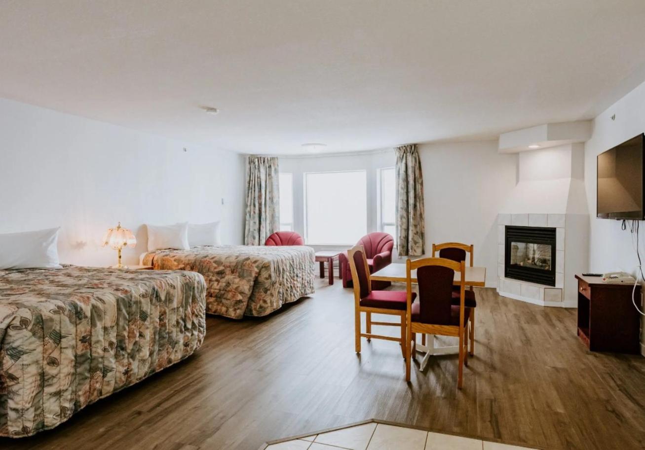 Western Budget Plus Mosaic Suites Penhold Esterno foto