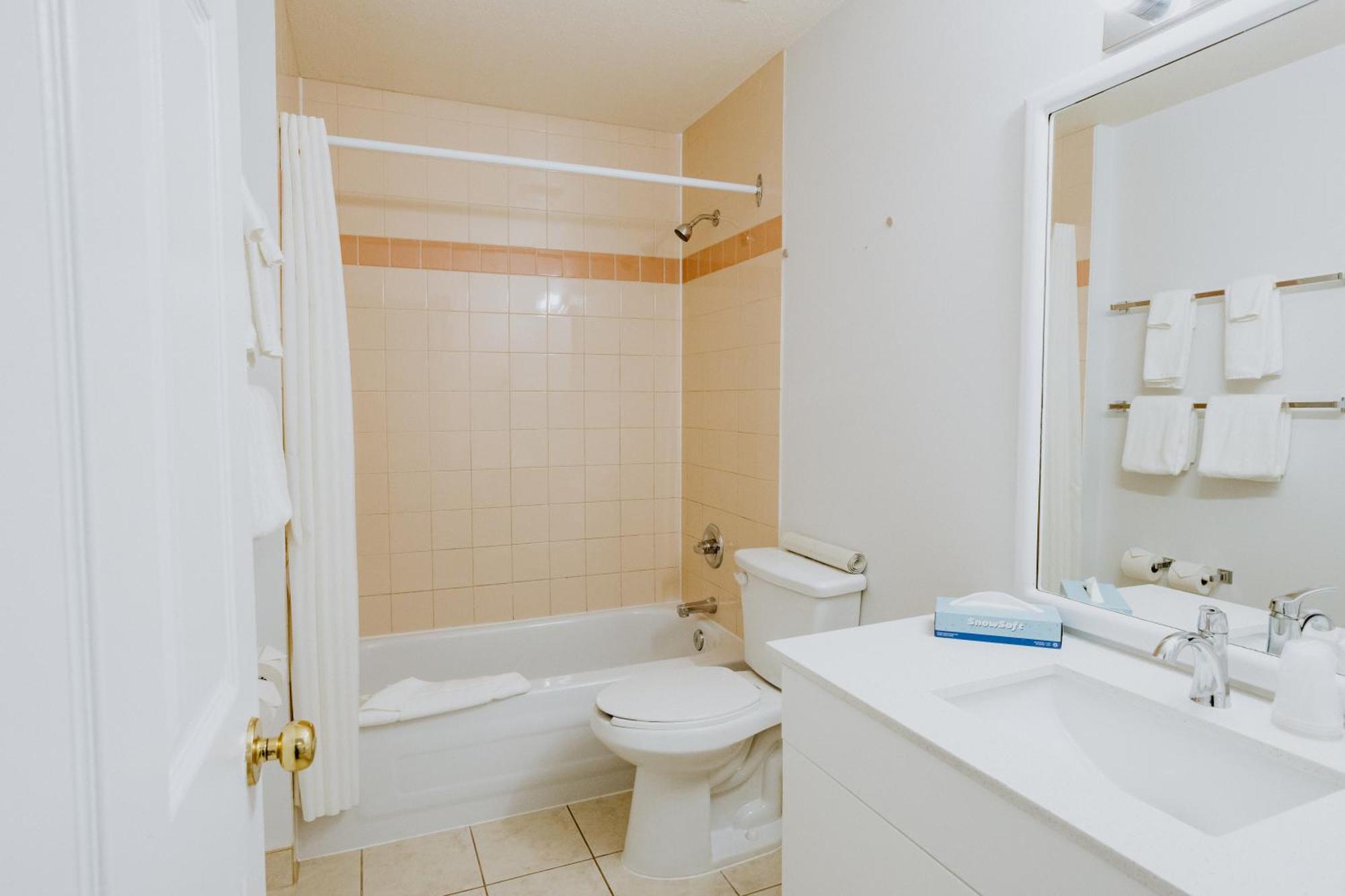 Western Budget Plus Mosaic Suites Penhold Esterno foto