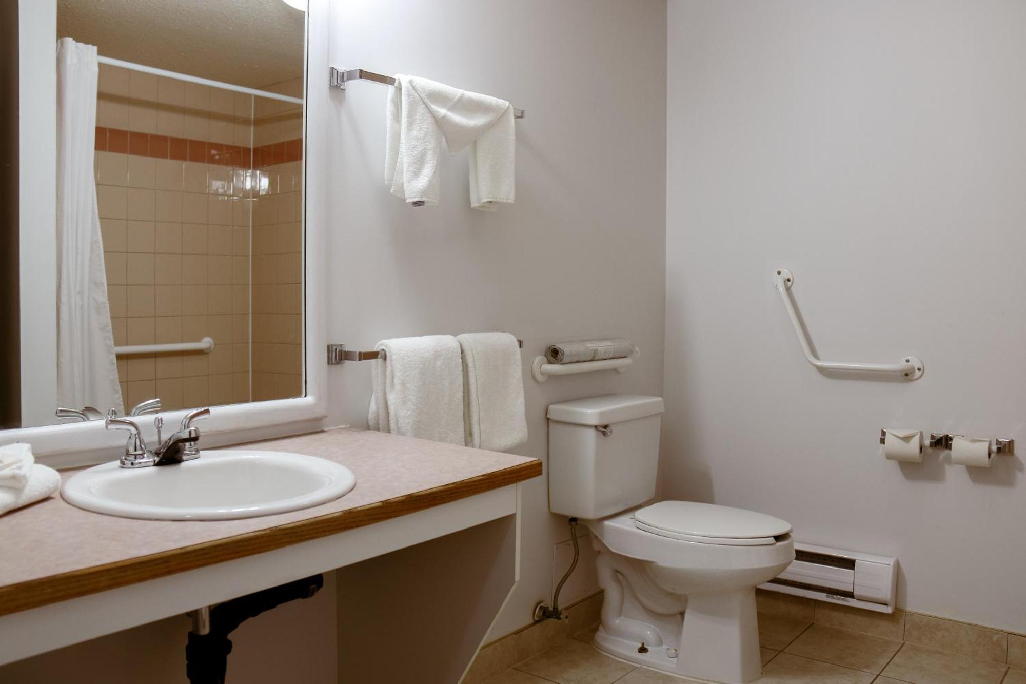 Western Budget Plus Mosaic Suites Penhold Esterno foto
